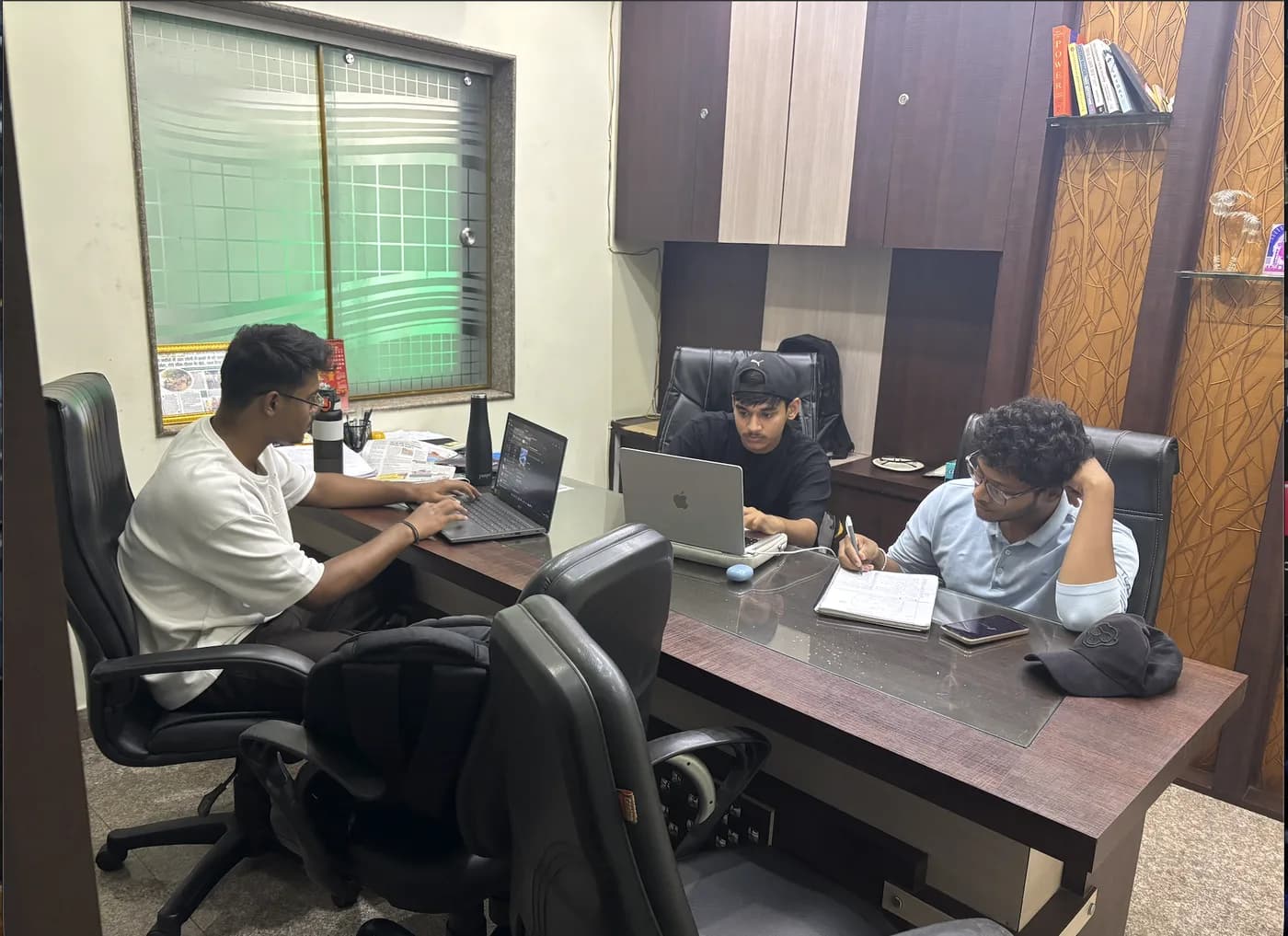 The Startup Launchpad team working together at a desk
